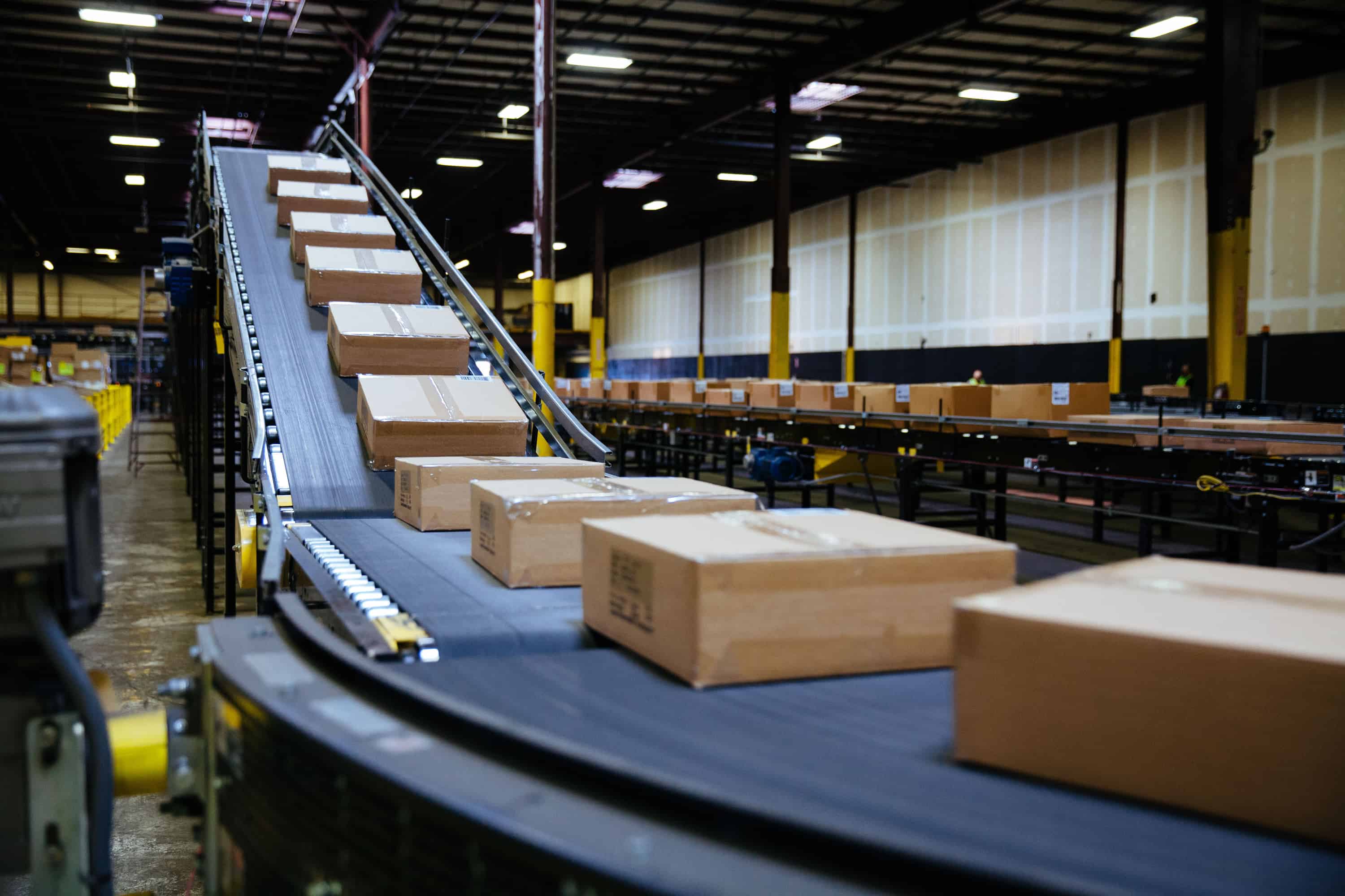 Boxes going down conveyor belt