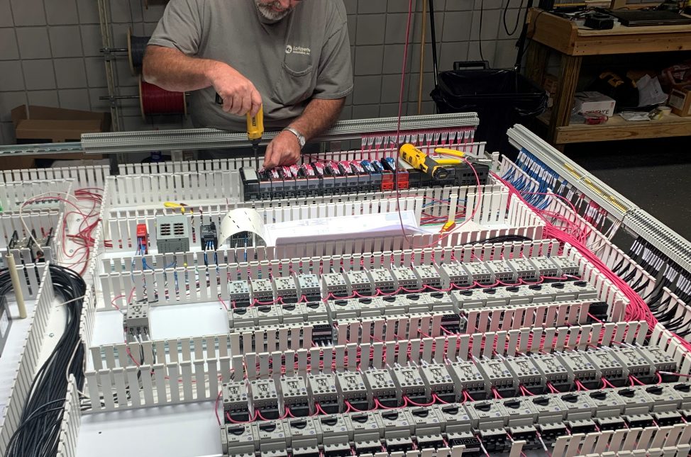 Man working on circuit board